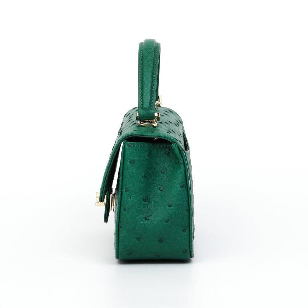 Rossie Viren women's ostrich leather mini flap chain handbag with top handle and crossbody strap, showing textured leather and gold hardware.