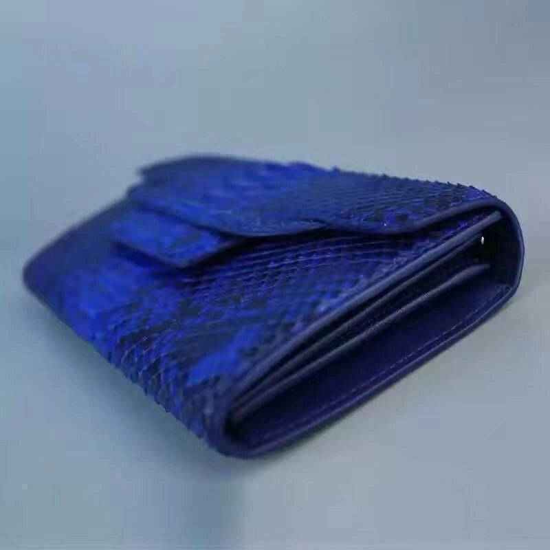Pochette da donna in pelle di pitone blu