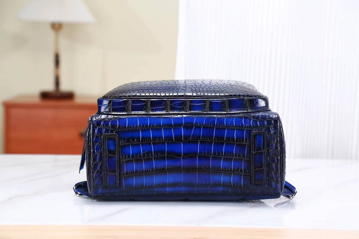Zaino vintage in pelle di coccodrillo blu