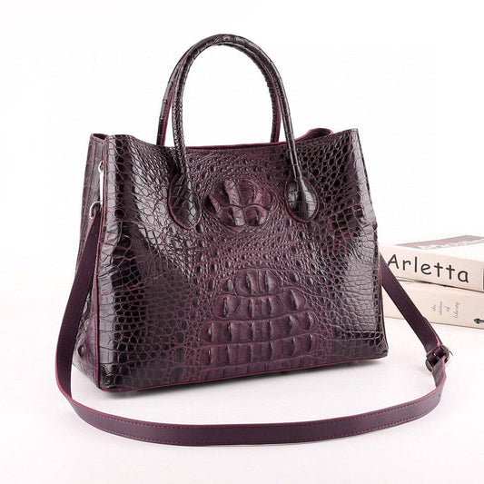 alt
Borsa a mano da donna in vera pelle di coccodrillo, modello satchel, marrone, 32 cm
