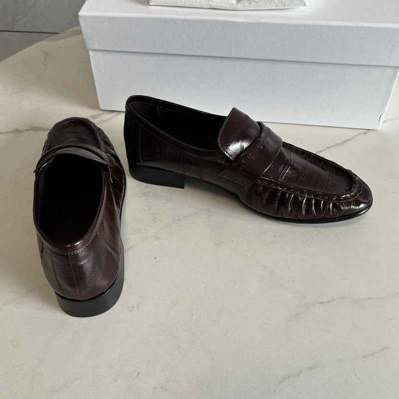 Eel skin loafers for women by Rossie Viren, featuring sleek design and smooth eel leather material.