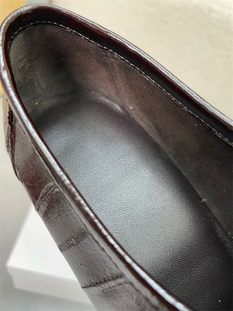 Eel skin loafers for women by Rossie Viren, showcasing stylish slip-on shoes with smooth eel skin texture and elegant design.