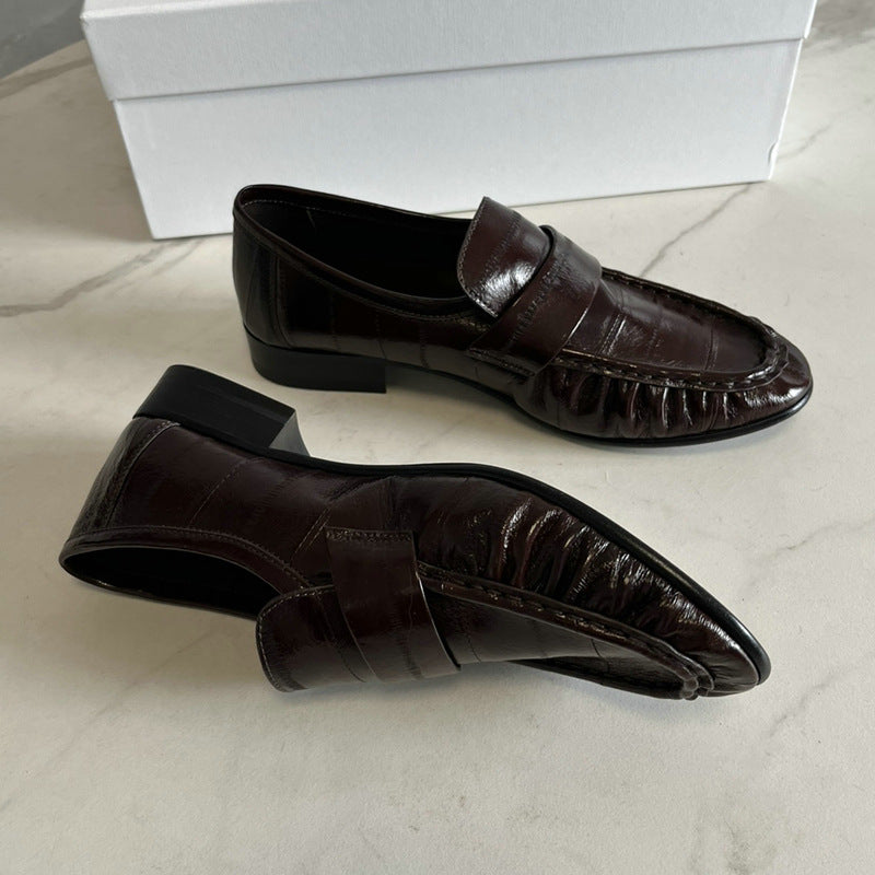 Eel skin loafers for women by Rossie Viren, showing stylish slip-on shoes with smooth eel leather finish.