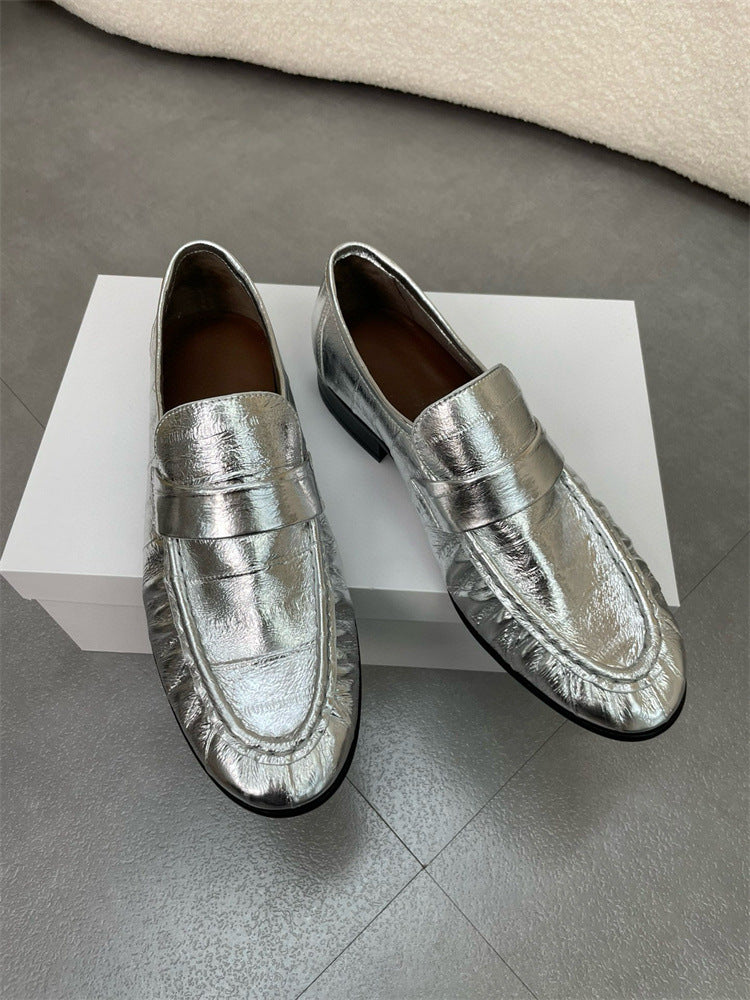 Eel skin loafers for women by Rossie Viren, stylish leather shoes with sleek design and slip-on style.