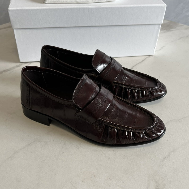 Rossie Viren eel skin loafers for women, stylish shoes with smooth eel skin texture and classic slip-on design.