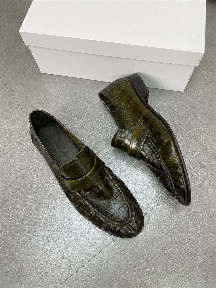 Rossie Viren eel skin loafers for women, stylish shoes with sleek eel leather exterior and classic slip-on design.