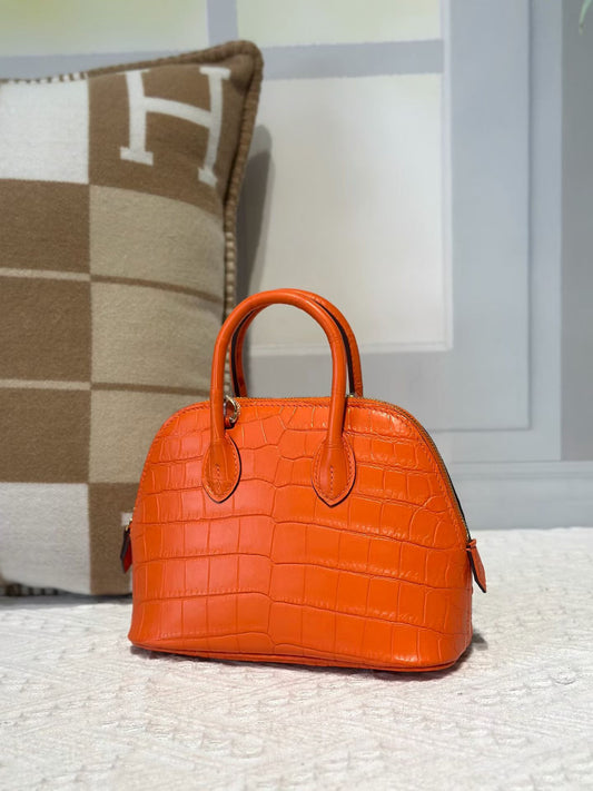 Mini borsa bowling con manico superiore in vera pelle di coccodrillo arancione