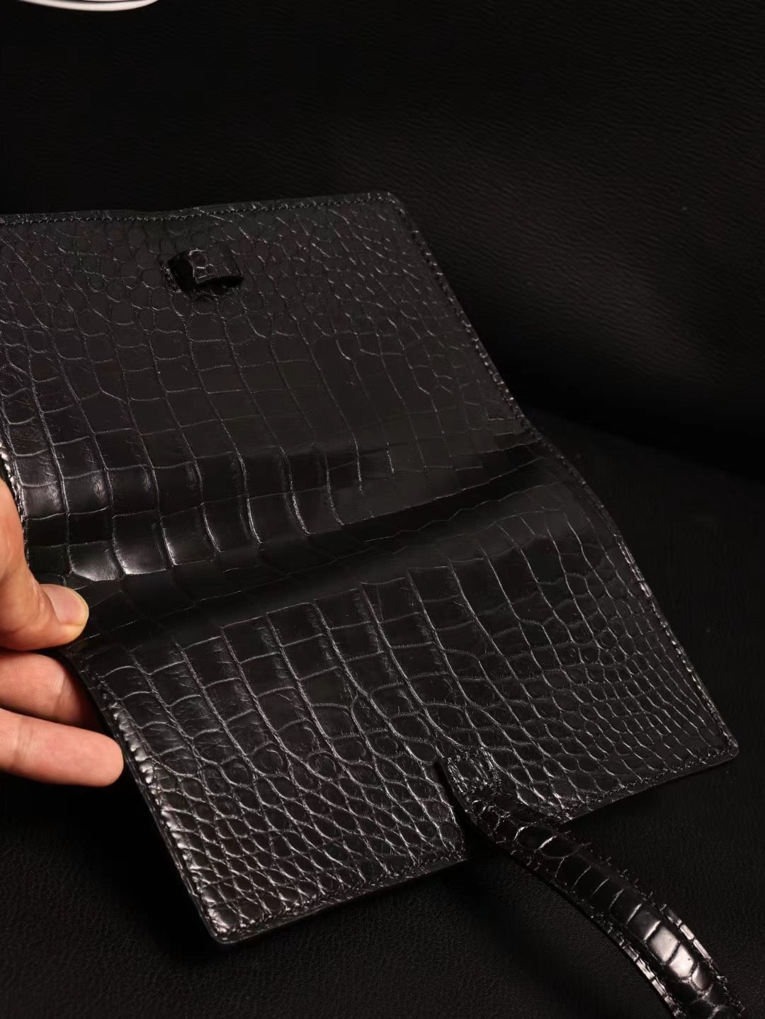 Rossie Viren genuine crocodile leather cigar bag used as a stylish card holder with textured crocodile pattern.
