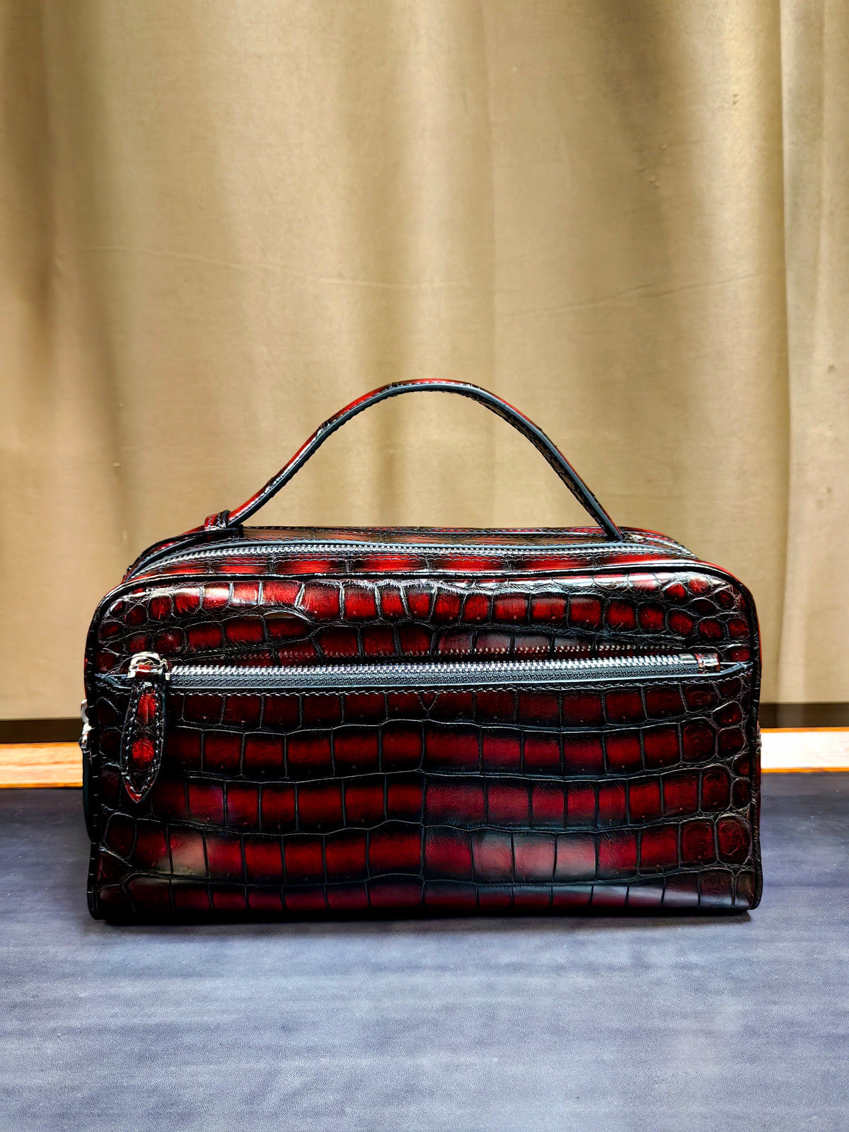 alt
Pochette classica in vera pelle di coccodrillo