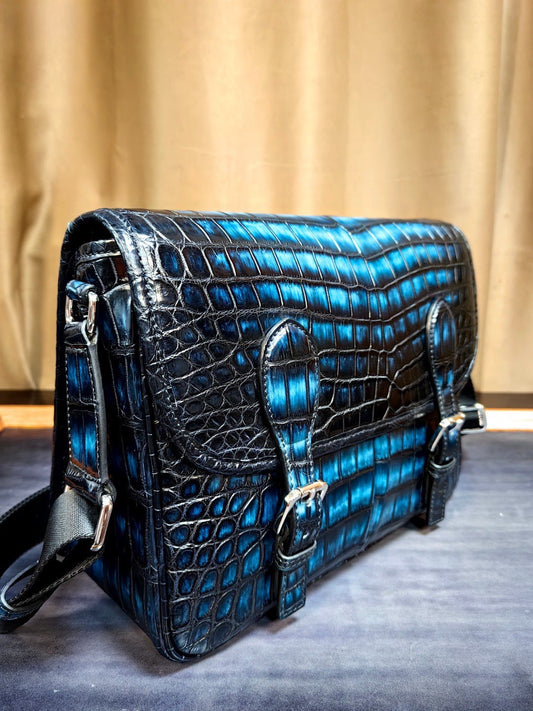 alt
Borsa postino vintage in pelle di coccodrillo