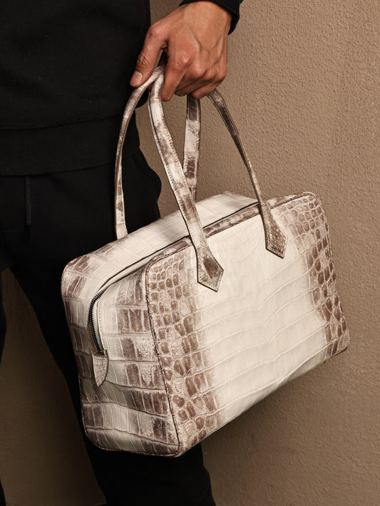 alt
Borsa tote weekend in vera pelle di coccodrillo bianca Himalaya