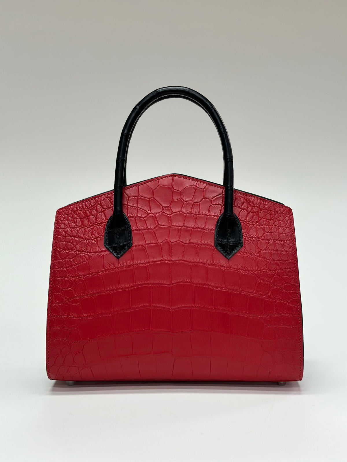 alt
Borsa con manico superiore in pelle di coccodrillo rossa