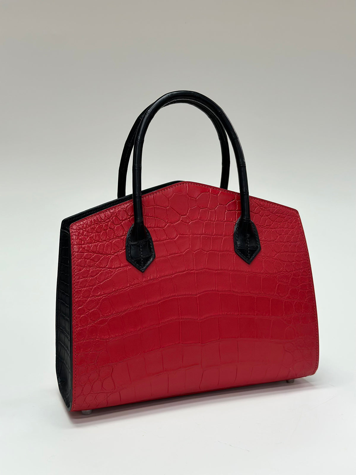 alt
Borsa a mano in pelle di coccodrillo rossa