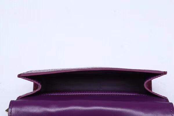 alt
Borsa con manico superiore effetto coccodrillo viola