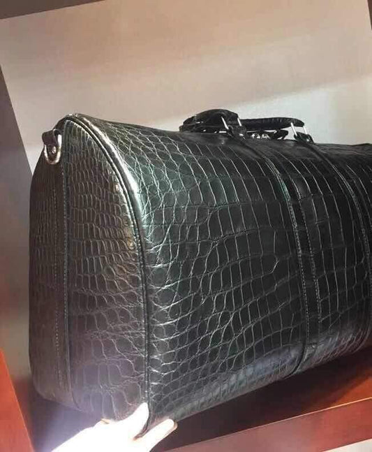 alt
Preordina borsa da viaggio in vera pelle di pancia di coccodrillo siamese