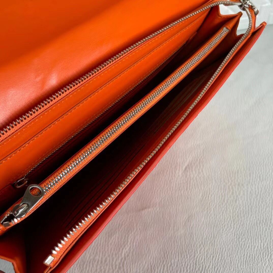 Women's genuine crocodile leather clutch with card holder by Rossie Viren, featuring a sleek, textured crocodile pattern and compact design.