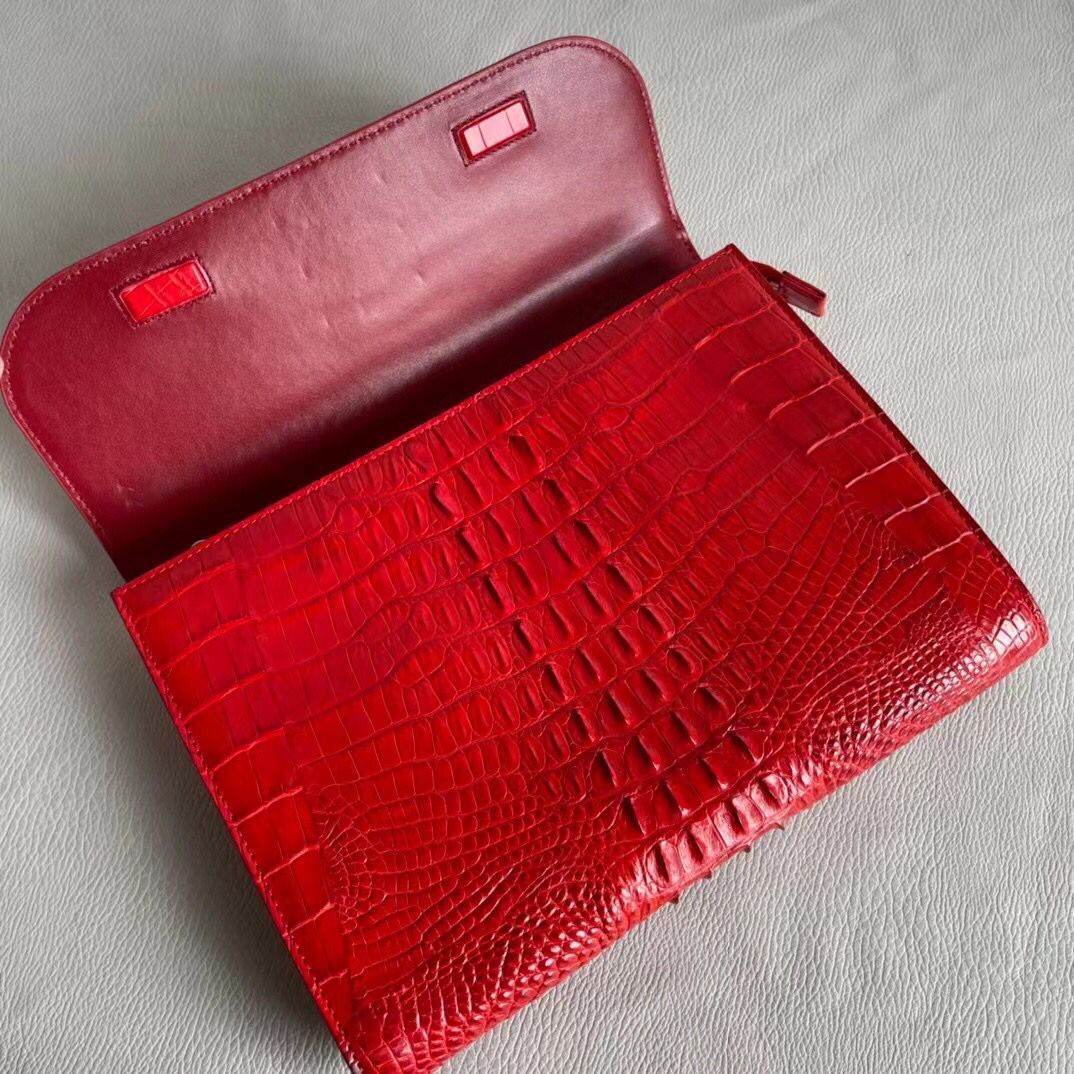 Women's genuine crocodile leather clutch by Rossie Viren, featuring a sleek card holder design with textured crocodile pattern.