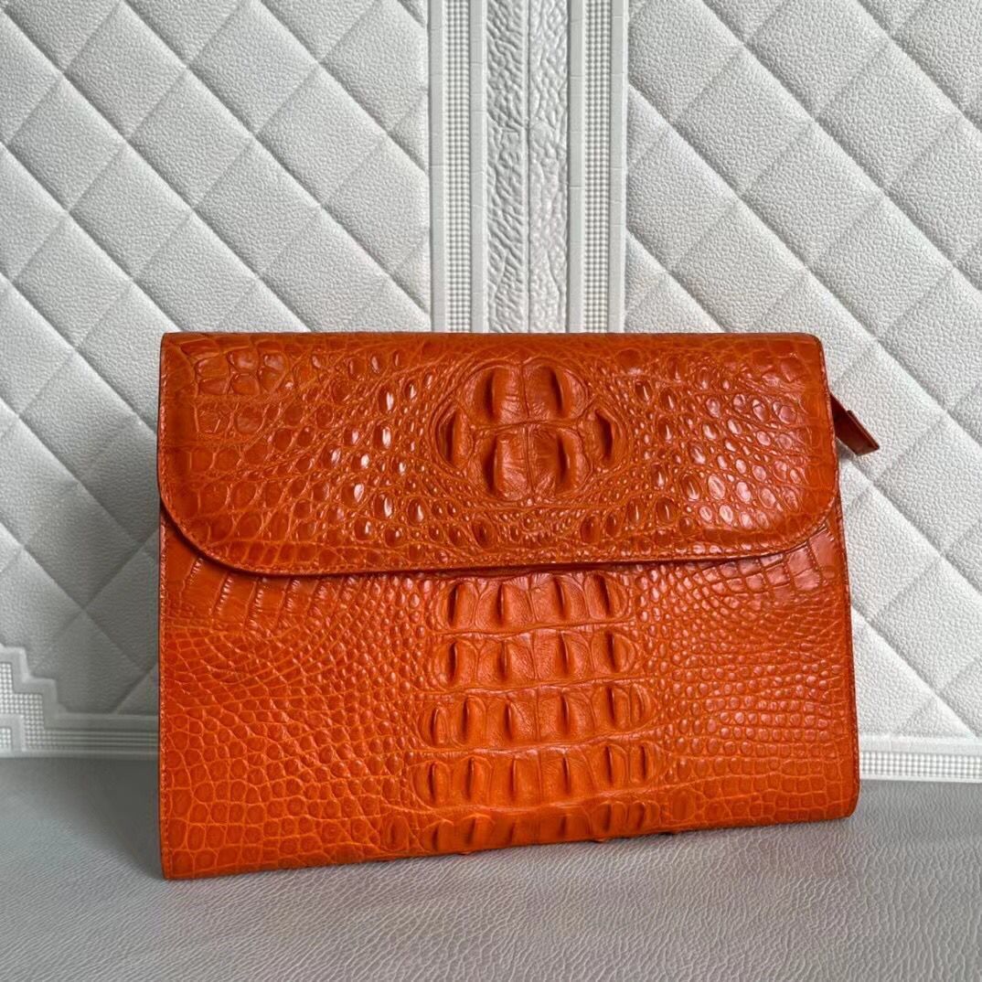 Women's genuine crocodile leather clutch card holder by Rossie Viren, showcasing textured crocodile pattern and sleek compact design.