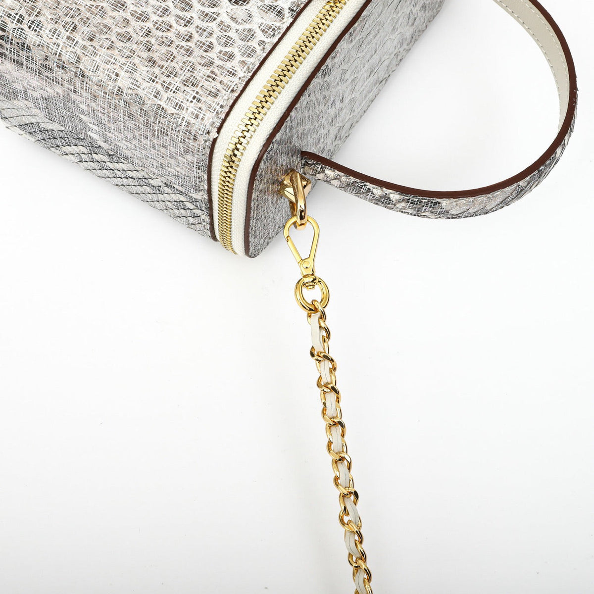 Women's Python leather top handle cosmetic crossbody bag by Rossie Viren, featuring a sleek design and compact size.